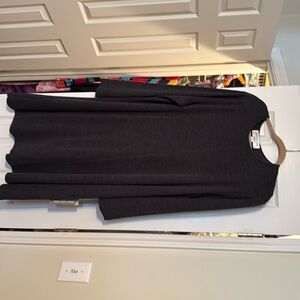 Grey dress with shoulder pads. Perfect fall to winter dress. New with tags